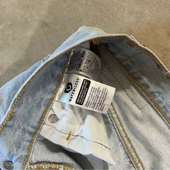 Levi's 501 Light Blue Denim Jeans. Button fly. Rips. Size 27. Leg 28. Like new - Picture 7 of 9